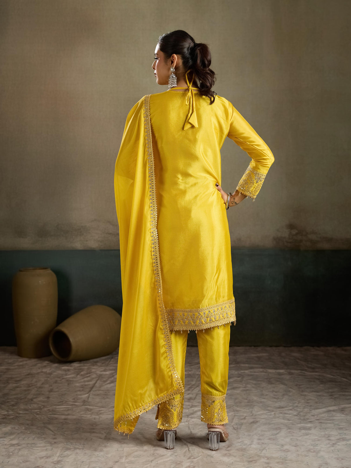 Yellow gold zari embroidered silk kurta pant set - back view showing tassel hem border and dupatta