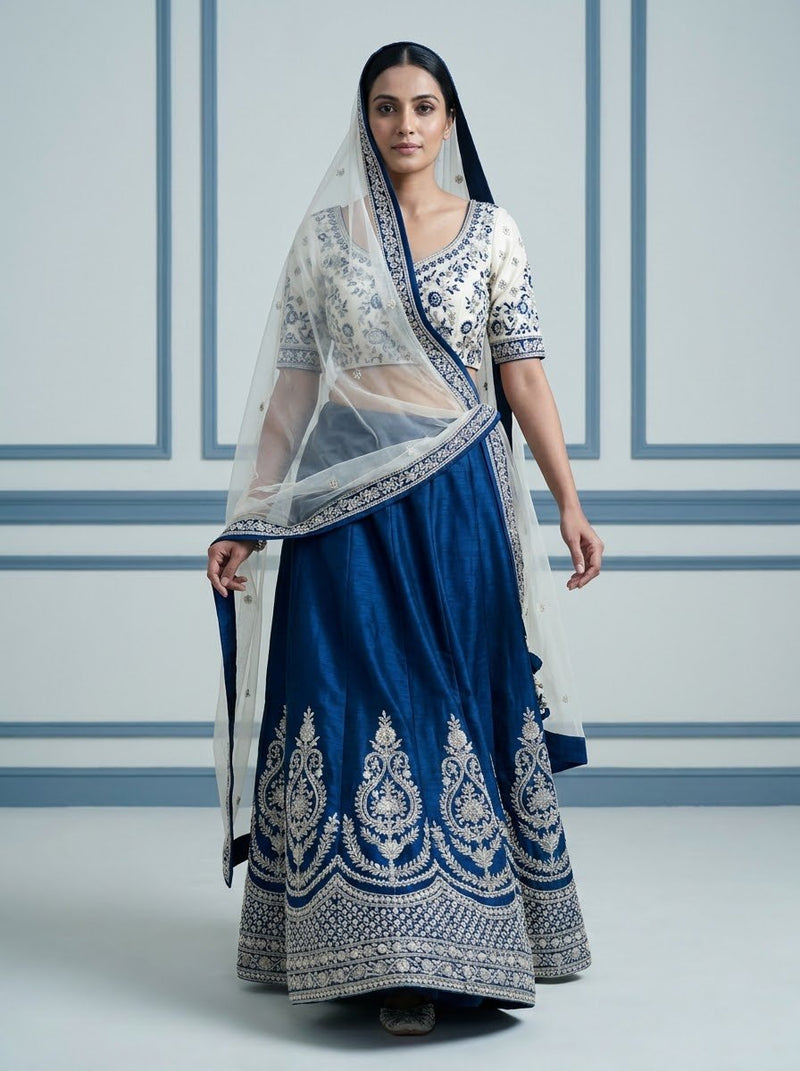 Embroidered Bridal Lehenga – Indigo Blue with Ivory White Choli & Sheer Net Dupatta