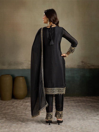 Black gold zari embroidered silk kurta pant set - back view showing tassel hem border and dupatta