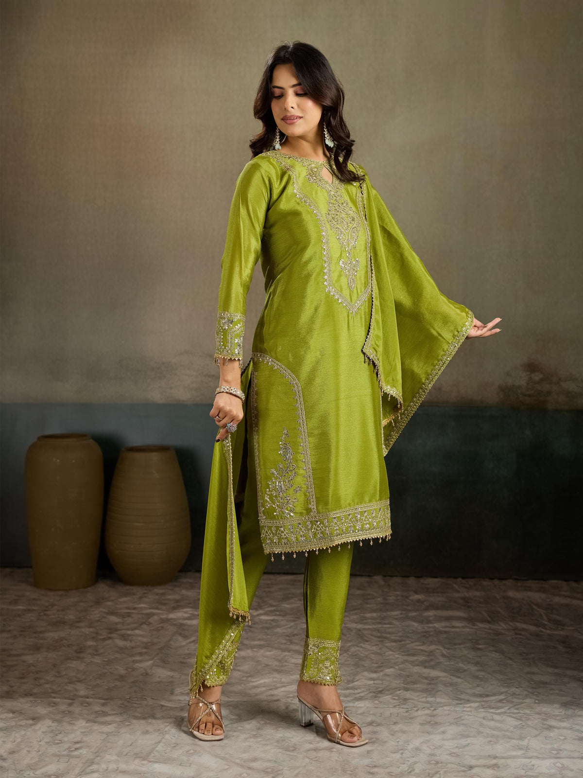 Olive green gold zari embroidered silk kurta pant set - elegant front view dupatta held open showing embroidery