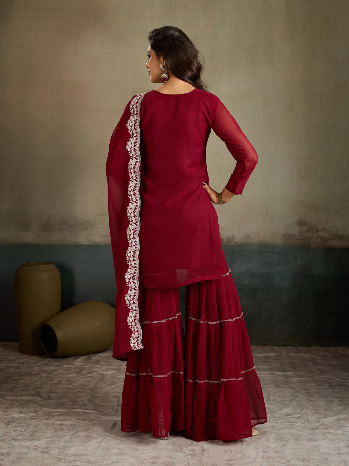 Maroon silver zari embroidered georgette kurta sharara set - back view with embroidered dupatta