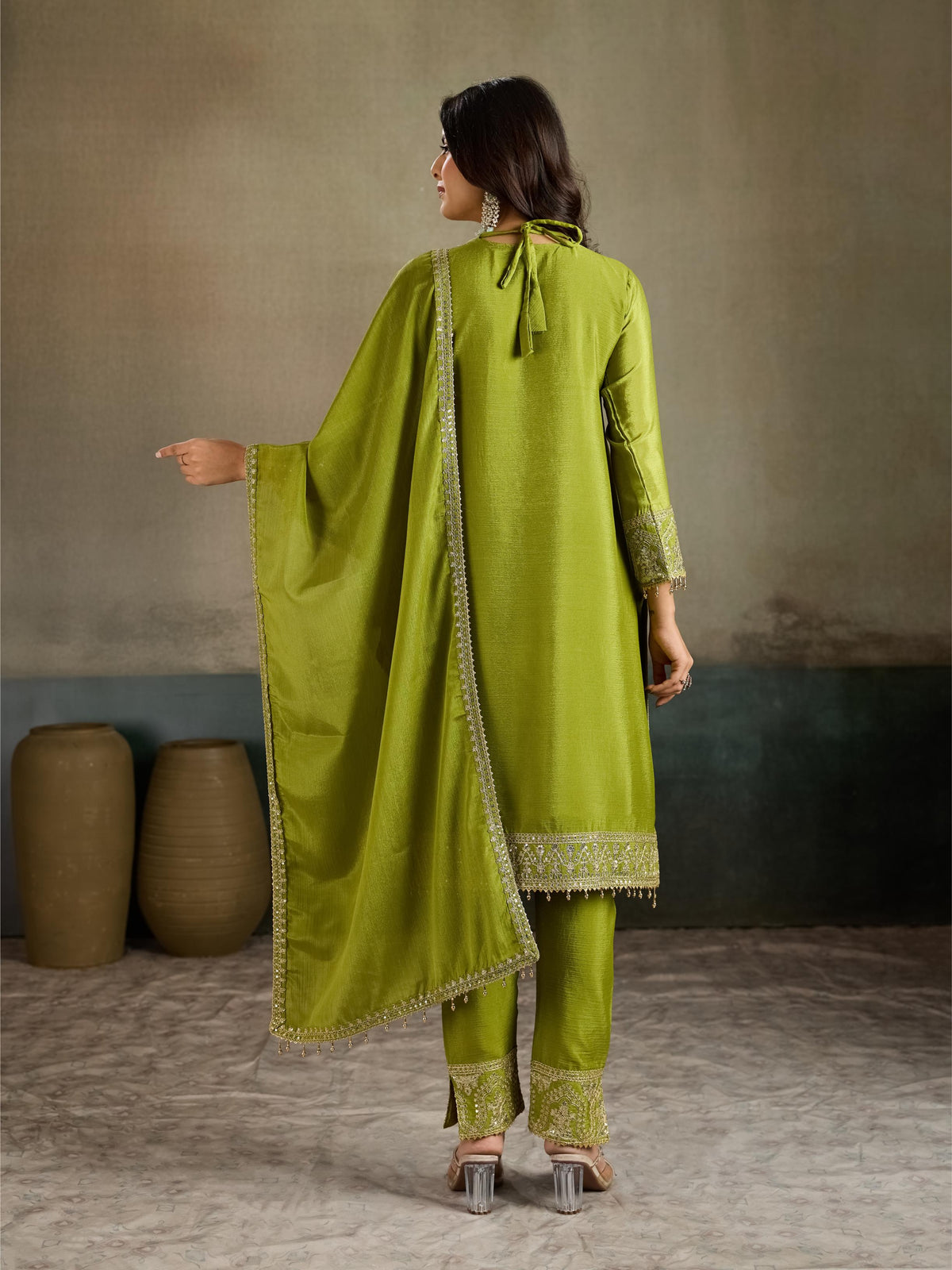 Olive green gold zari embroidered silk kurta pant set - back view with dupatta showing tassel border